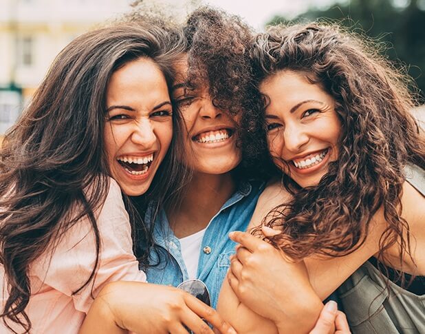 young group of smiling girls