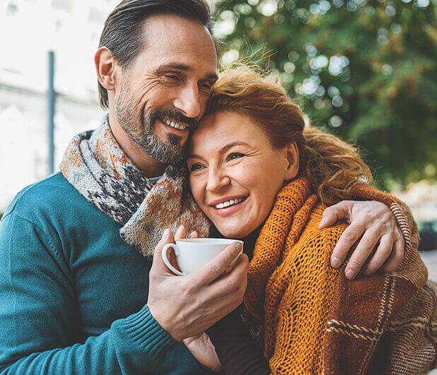 happy couple drinking coffee together