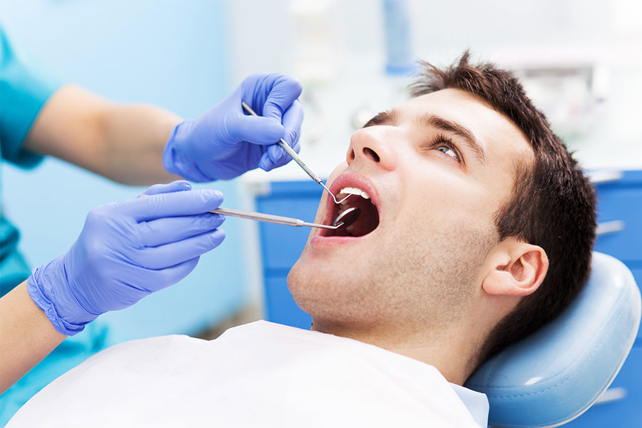 man at the dentist