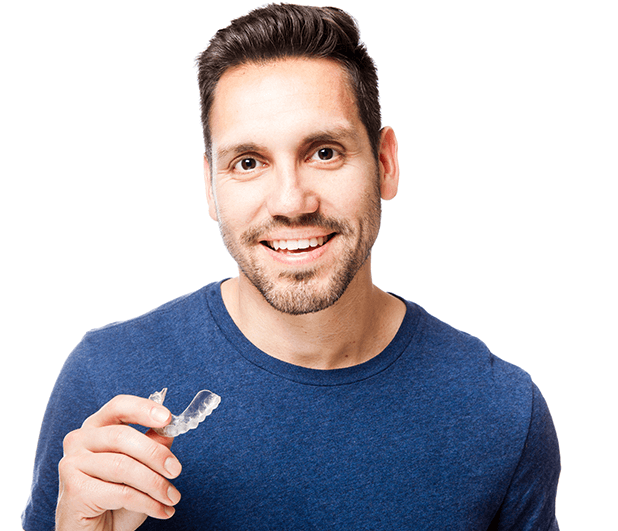 man holding clear aligner